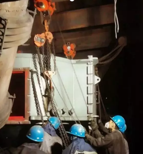 手拉倒链在更换后溜机头耦合器中的应用过程